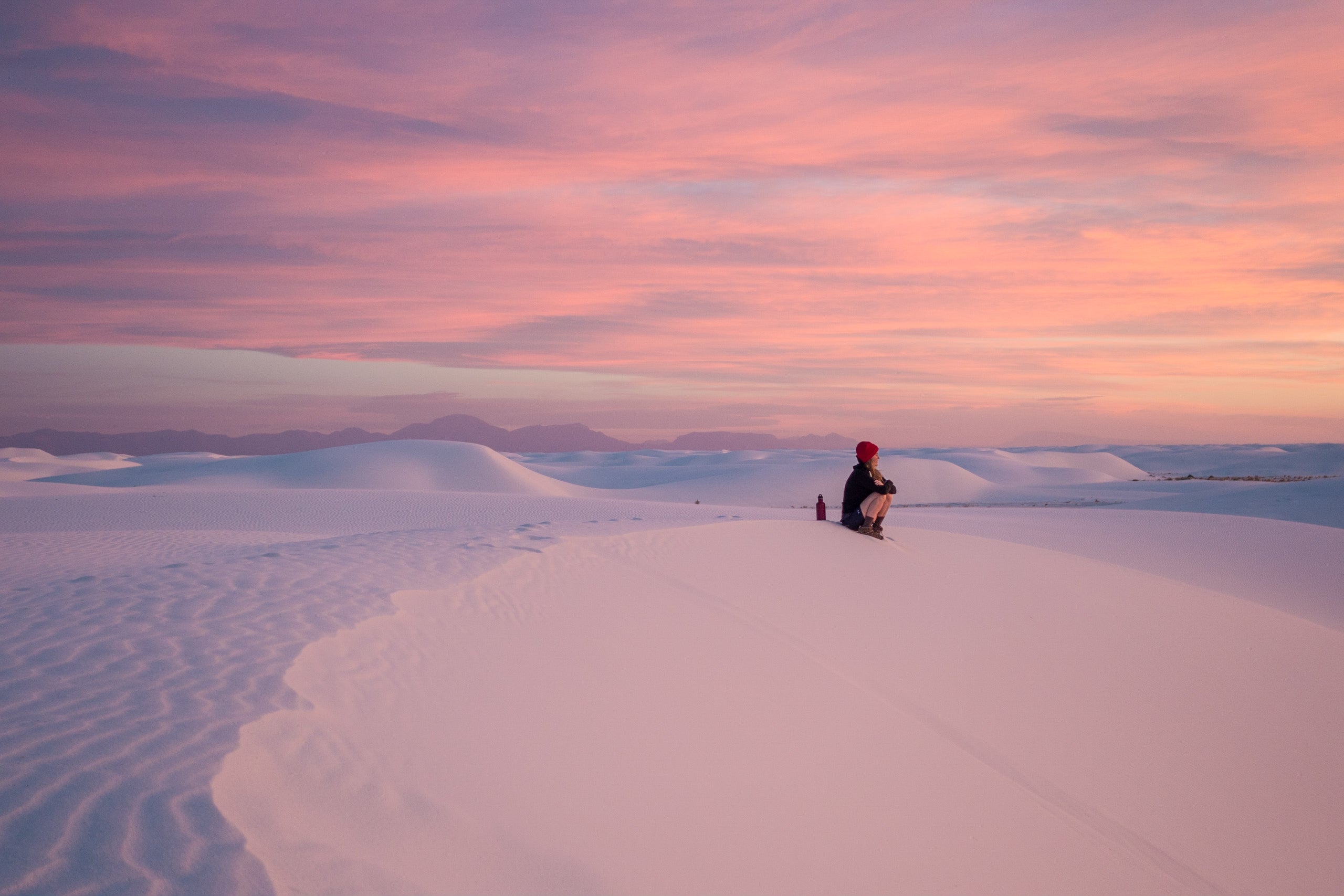 Watching the sunrise in White Sands National Park.